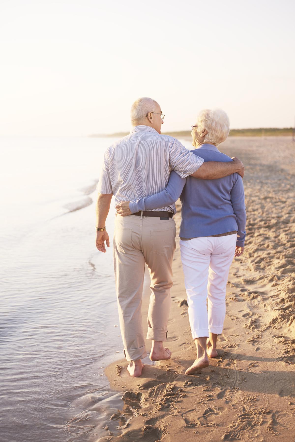 Retired couple enjoying financial stability